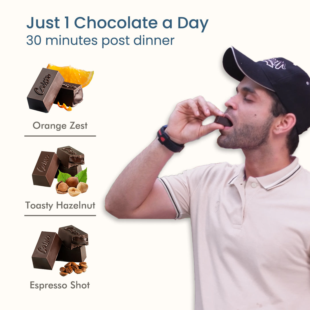 Man eating Rekindle for Men sugar-free dark chocolate bar with Espresso Shot flavor, boosting energy and testosterone levels.